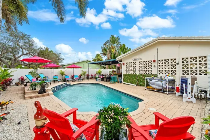 Splash, float, and relax in a private heated pool at this 4-bedroom South Florida vacation home.