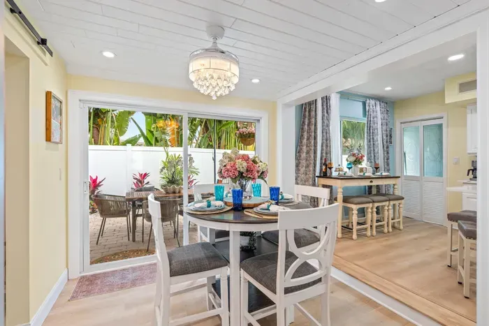 A welcoming table for memories—shared meals in your private Lighthouse Point vacation home.