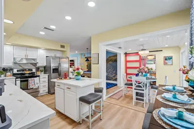 Cook, chat, and connect—kitchen flows seamlessly into living and dining for effortless together time.