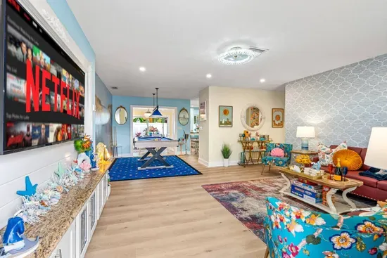 Spacious family living area with open flow to the kitchen and dining—made for groups and easy conversation.