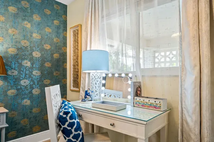 This convenient desk can be used as a vanity or a workspace where you can set up your laptop.