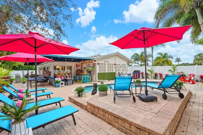 Splash, float, and relax in a private heated pool at this 4-bedroom South Florida vacation home.