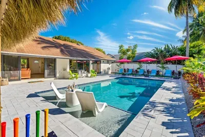 The in-pool lounges are the heart of the backyard.