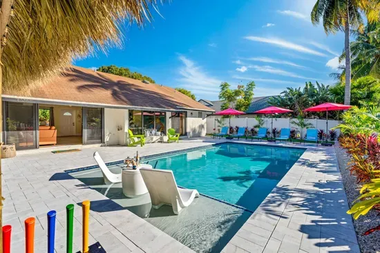 The in-pool lounges are the heart of the backyard.