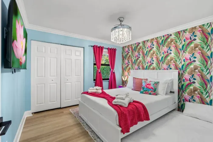 The guest bedrooms offer queen beds with twin trundles, making them perfect for families with kids or groups needing flexible sleeping arrangements.