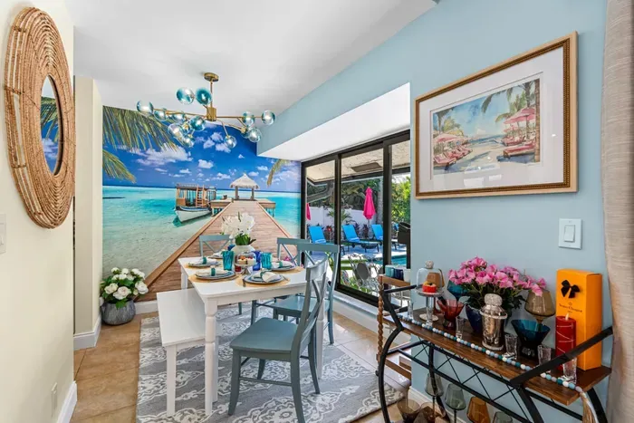 Fix yourself a drink from the cart in the lavish dining area.