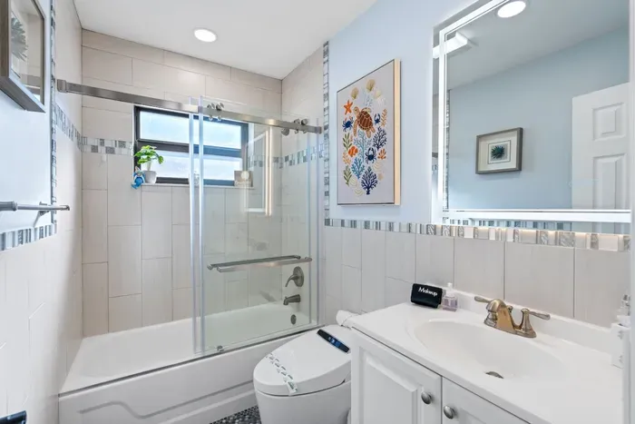 Clean, bright, and modern, the bathrooms offer a spa-like feel that complements the rest of the home's stylish design.