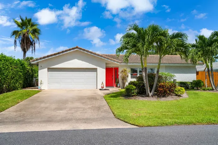 Arrive at your private Boynton Beach waterfront retreat, set in a quiet family neighborhood just minutes from South Florida's beaches, dining, and attractions.