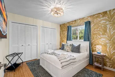Spacious closets with hangers and shelves, including a walk-in master closet, provide plenty of storage for beach gear, luggage, and outfits for nights out.