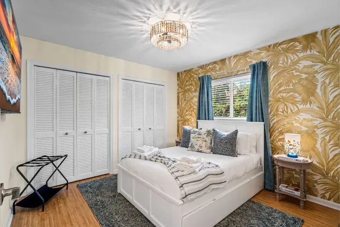 Spacious closets with hangers and shelves, including a walk-in master closet, provide plenty of storage for beach gear, luggage, and outfits for nights out.