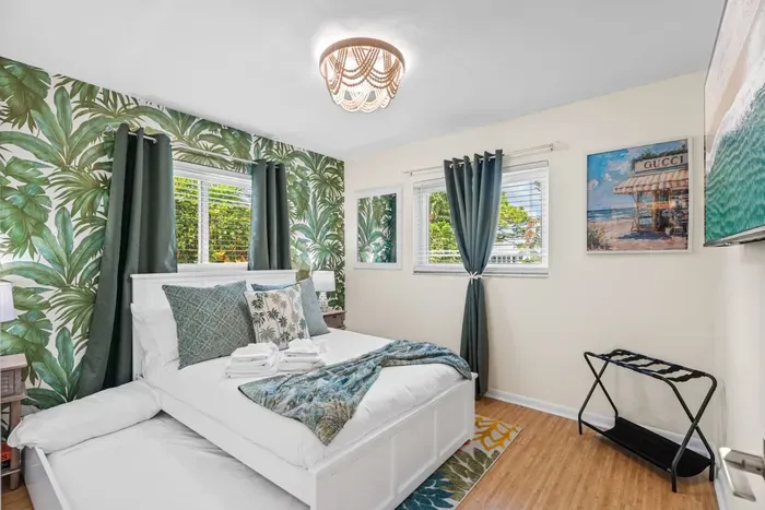 The guest bedrooms with queen beds and single trundles are perfect for families or groups, offering flexible sleeping arrangements without sacrificing comfort.