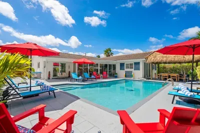 Soak up the South Florida sunshine on loungers around the pool, then cool off with a refreshing dip or nap in the shade of the tiki hut.