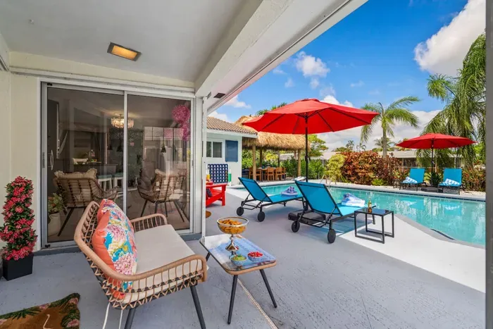 Step into your private backyard waterfront oasis with a heated swimming pool, where you can float, swim, and relax just steps from the canal.