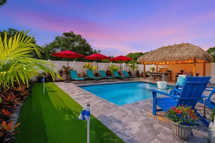 Cool off in the pool or soak up the sun on the marble patio, enjoying the privacy of your own tropical retreat.