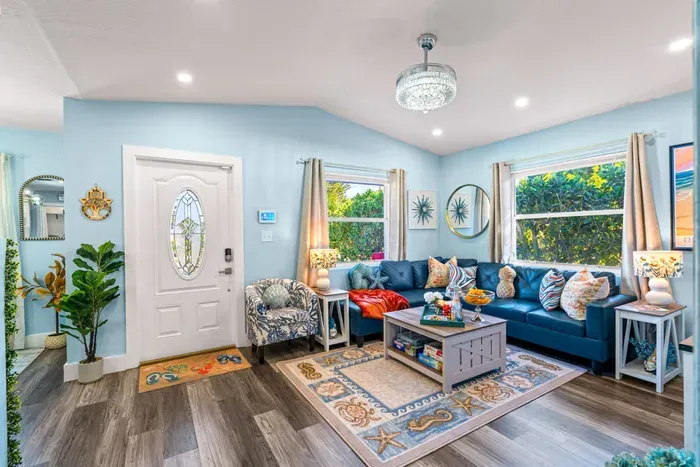 Sink into the plush L-shaped leather sofa and enjoy the open-concept living area, perfect for unwinding or having hours of fun with your family and friends.