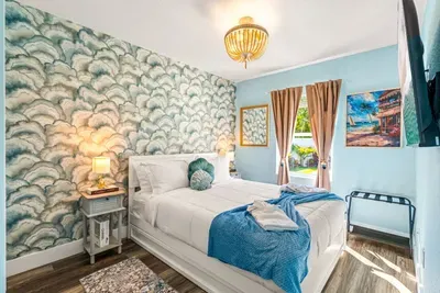 Let's check out the bedrooms. You'll be able to choose from three lovely bedrooms that can accommodate up to 8 guests.