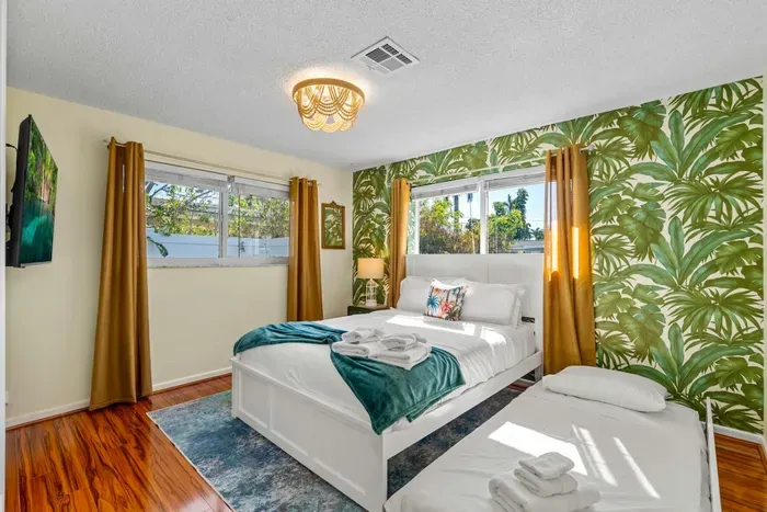 Kids will love the twin trundle beds for extra sleeping space, making it perfect for families.