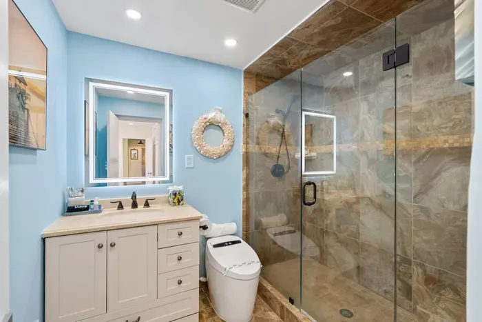 Both bathrooms are designed for comfort and convenience, with thoughtful details throughout.