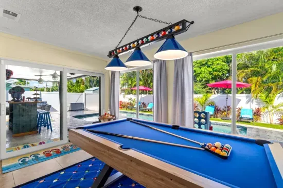 Challenge friends to a game of billiards in the dedicated pool table area, ideal for entertainment and friendly competition.
