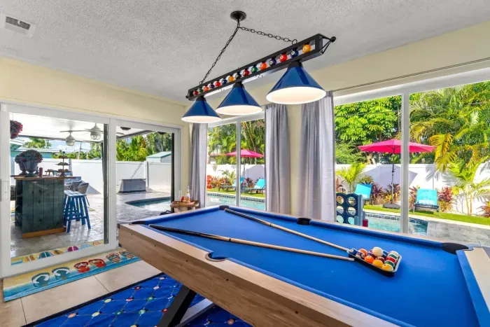 Challenge friends to a game of billiards in the dedicated pool table area, ideal for entertainment and friendly competition.