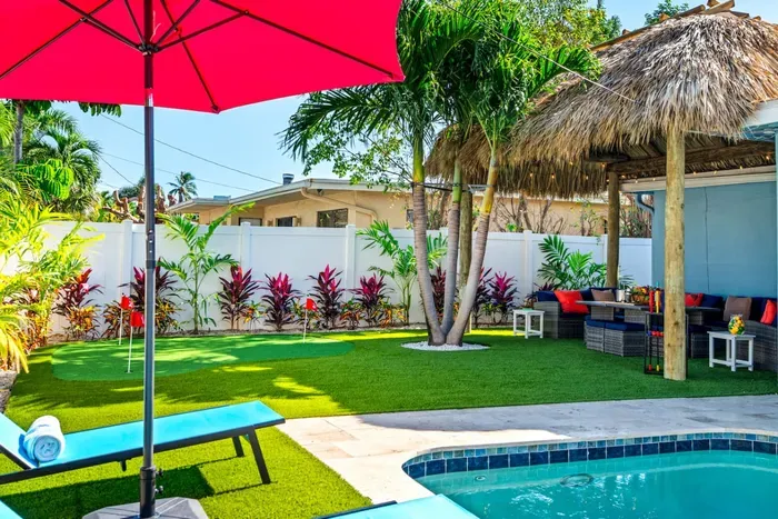 The spacious lawn is perfect for kids and pets to play, offering plenty of room for outdoor activities.