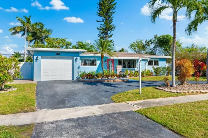 There's plenty of parking space at the driveway in front of the house, which will enchant you with its beautifully landscaped yard.