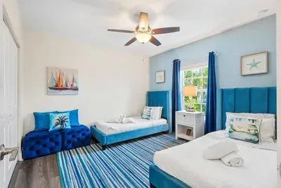 Bedroom number 4, fit with two twin sized beds - allowing everyone to get a good night's sleep with their own comfortable bed.