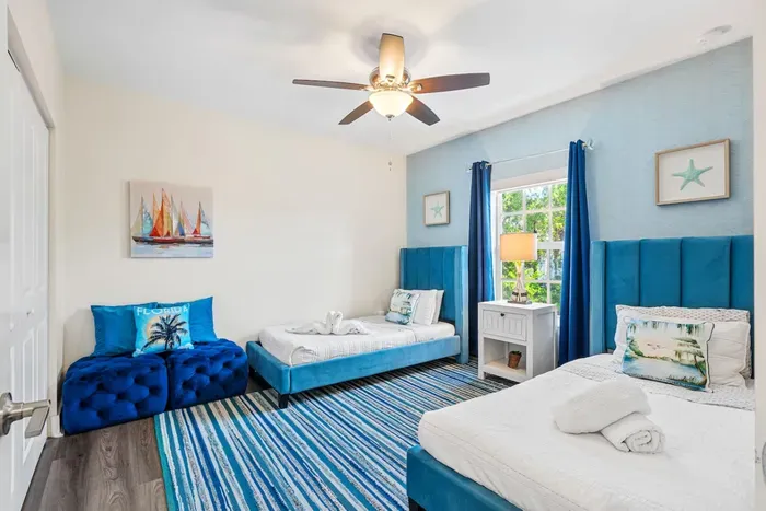 Bedroom number 4, fit with two twin sized beds - allowing everyone to get a good night's sleep with their own comfortable bed.