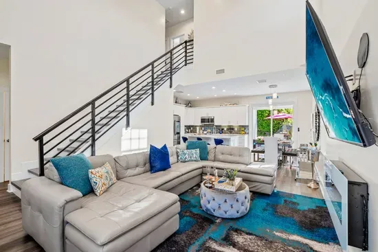 With the beautiful kitchen, dining and living room all downstairs, the staircase leading up is where the second floor bedrooms are waiting. Also with a full bathroom!