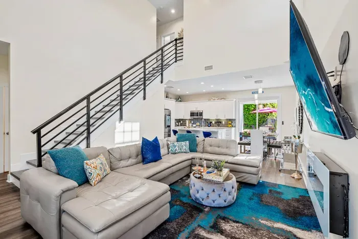 With the beautiful kitchen, dining and living room all downstairs, the staircase leading up is where the second floor bedrooms are waiting. Also with a full bathroom!