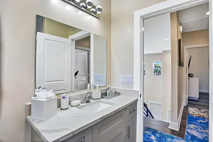 The toilet is also a bidet, whilst the vanity area provides lots of room for everyone's lotions and potions.