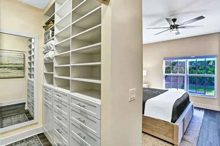 This stunning room also has its own large walk in closet area with so much space for throughout your stay.