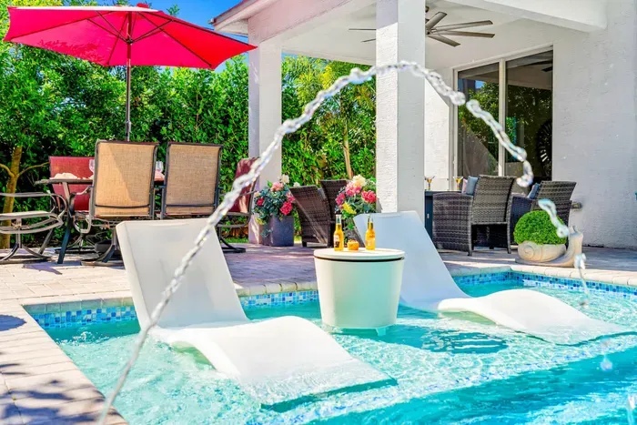 Enjoy the calming noise of the deck jets splashing into the pool as you relax poolside.