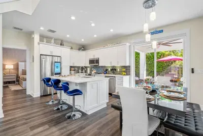 Make your way to the outdoor oasis through glass sliding doors just at the end of the dining table.