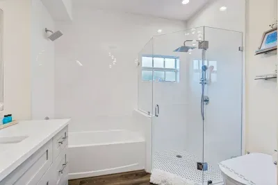 Step on into the ensuite bathroom, fitted with a LED rainfall walk in shower and smart toilet/bidet to pamper yourself each time you enter the bathroom.