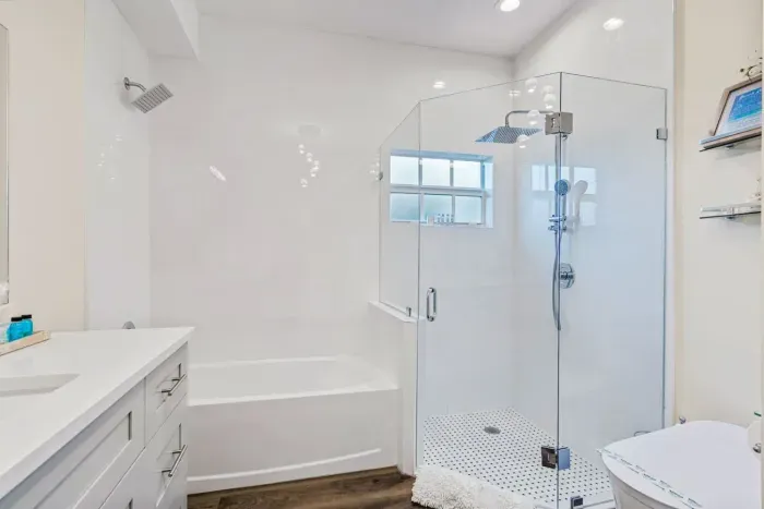 Step on into the ensuite bathroom, fitted with a LED rainfall walk in shower and smart toilet/bidet to pamper yourself each time you enter the bathroom.