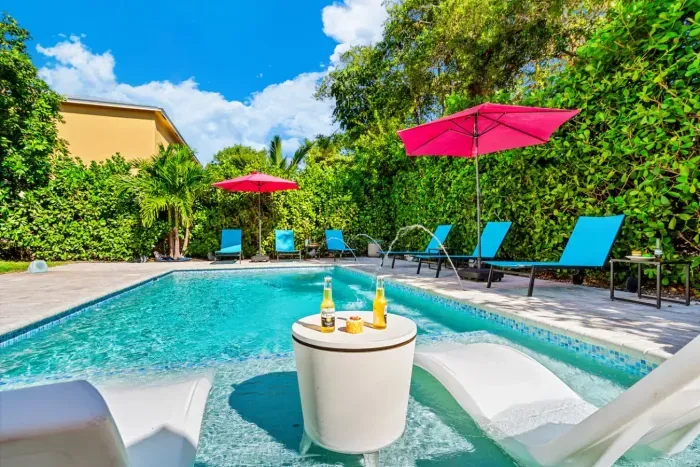 Crack open a cold one while soaking up the sun on the pool loungers. It can't get much better than this!