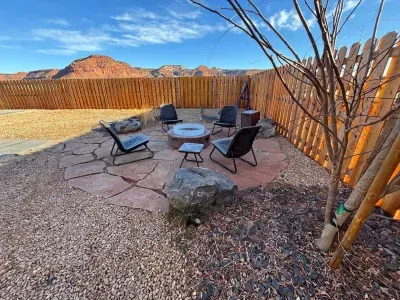 Gather around the firepit for smores and star gazing in the evening. Views of the red cliffs are the perfect scenery.