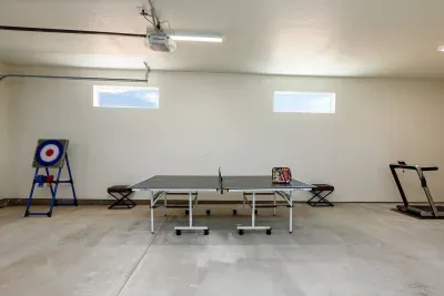 Have fun in the third car garage which features ping pong, axe throwing, and a treadmill!