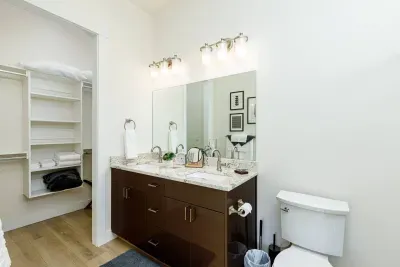 Second bathroom with closet for linens. 