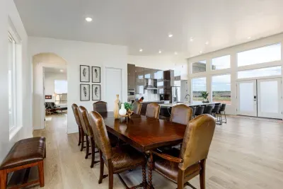 Dining table seats 8 for sit-down meals. 