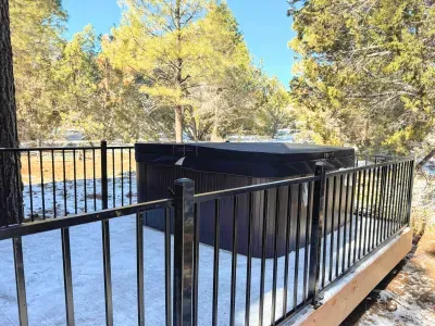 Private forest-view hot tub on deck—perfect for après-ski & stargazing