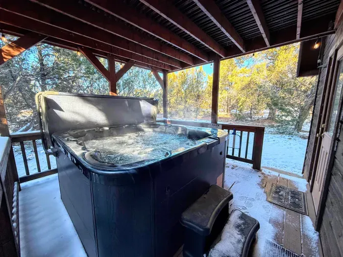 The private hot tub on the back deck is the perfect spot to relax and unwind. Spa towels are provided