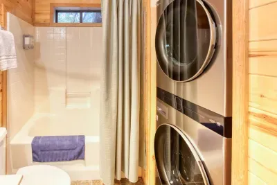 A stackable washer and dryer are available for use. Perfect for longer stays!