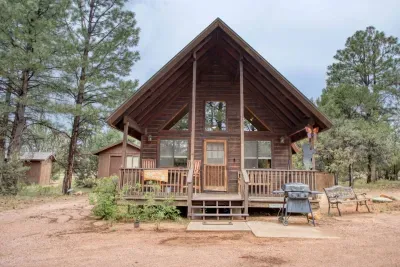 The Bear Paw cabin has a large front porch. A great spot to sit and drink your morning coffee.