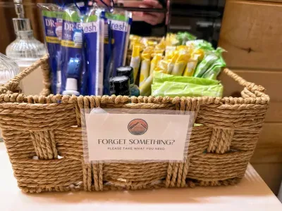 Thoughtful guest essentials basket with travel toiletries for added convenience