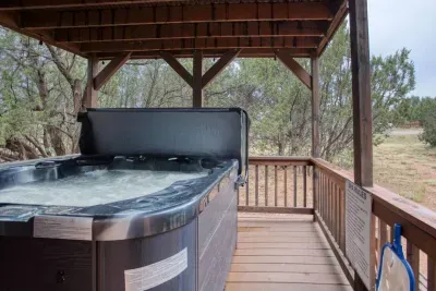 The private hot tub on the back deck is the perfect spot to relax and unwind. Spa towels are provided.