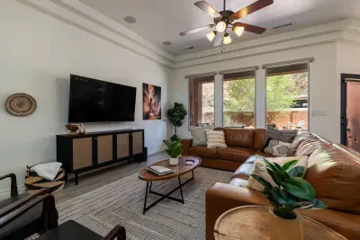 65 " smart TV, comfortable sectional, views of red cliffs