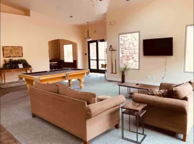 The community clubhouse has a pool table and game room.