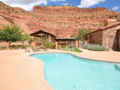 Gorgeous swimming pool with amazing red rock views. There is also an indoor pool and hot tub!